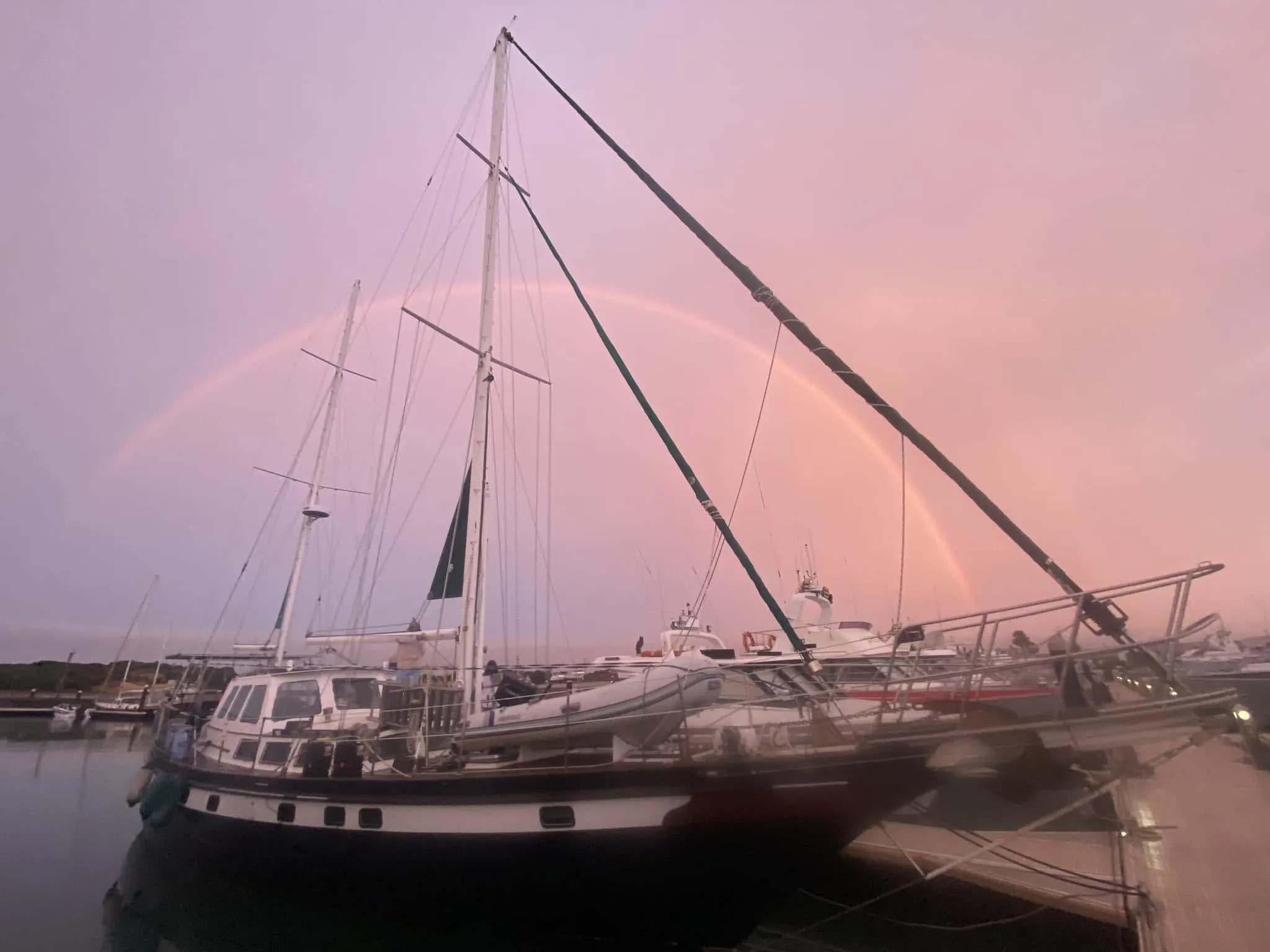 A rainbow over Sea Dragon in the marina at dusk
